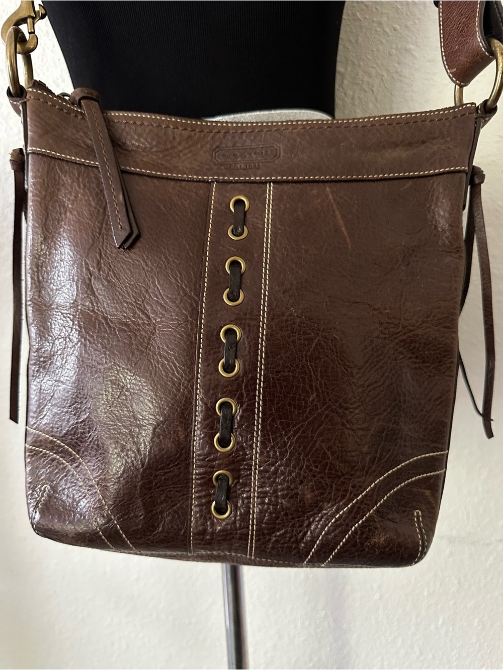Coach Brown Leather Crossbody Bag with Brass Eyelet Detail